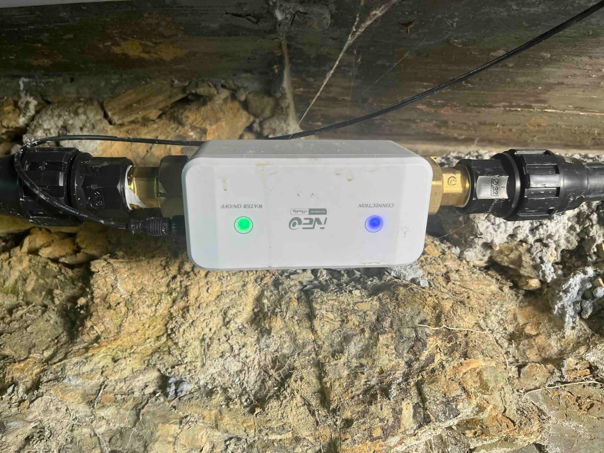 The Shelly NEO water meter and shut-off valve spliced into the main supply pipe